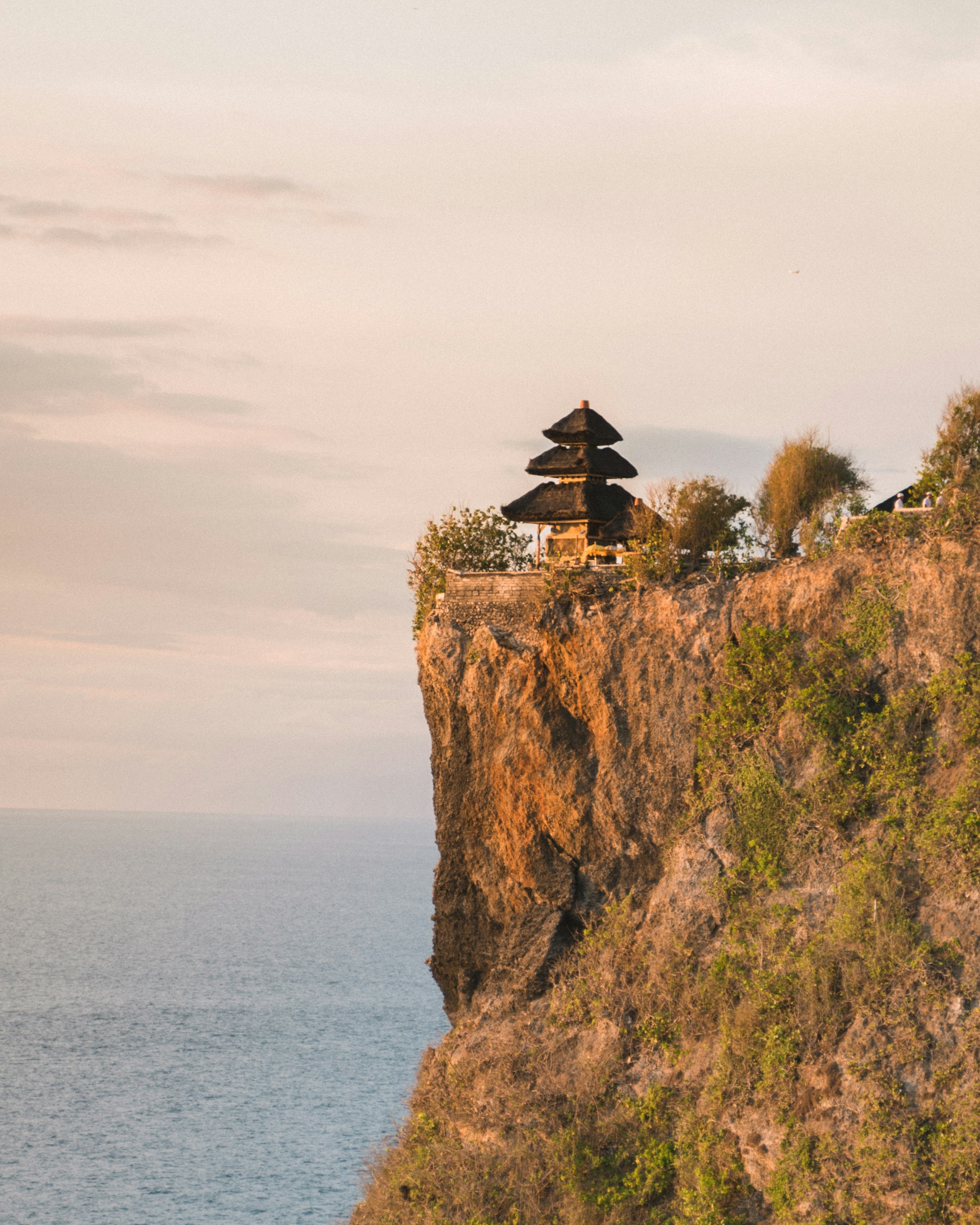 Uluwatu cliff temple at sunset, Bali