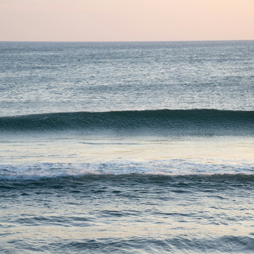 Surfing at Papanasam Beach
